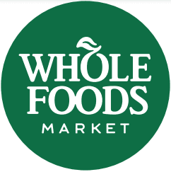 Official logo for Whole Foods Market, showing company name in white typeface inside a green circle background